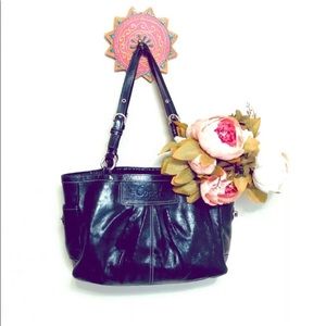 Shiny black leather coach purse